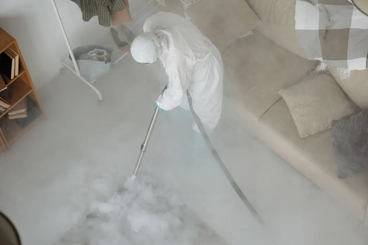 Biohazard cleanup technician in protective equipment, Northridge, OH